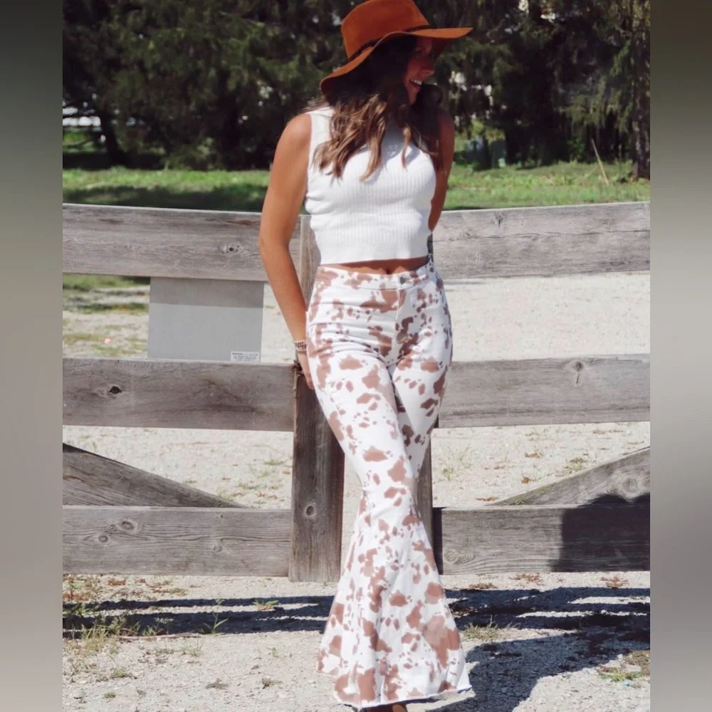 Altar'd State cow print flare jeans - Picture 1 of 10